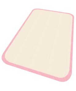 Vloerkleed effen Niños - crème/roze - Wasbaar 30°C - overzicht schuin